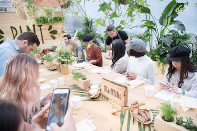 Influencers and media were invited to a session of the event, which featured a wooden centerpiece with the hashtag #GetPLNTed.