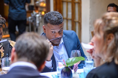 Parris Jordan, Director of the Caribbean Hotel Investment Conference (coming to Bermuda in November 2018), tries to select his favorite Lili Bermuda fragrance during the Virtual Visit to Bermuda luncheon at Palma in New York City.
