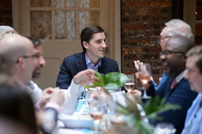 Sam Dangremond, Digital Articles Editor for Town & Country Magazine, chats with BTA partners at the Virtual Visit to Bermuda media luncheon at Palma in the West Village.