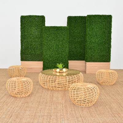 Taylor Creative Inc. rents faux hedges for indoor or outdoor use. The 70-inch hedges are available with a black, white, or oak base, and cost $325; the hedges are also available in a 30-inch option. Add a spring-like touch with the Cane Ottoman, which comes in two sizes and starts at $125 or $150 with a glass top.