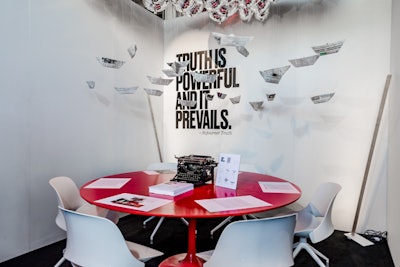 Novita Communications’ display celebrated the power of the media to inform people. The newspaper boats represented vessels of truth, floating above the noise.