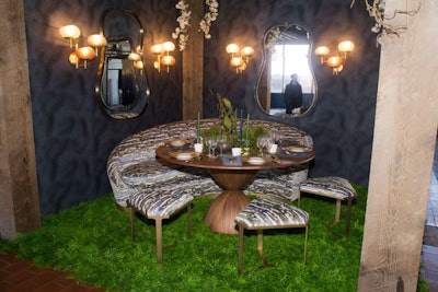 As an homage to Donghia’s Anjou mirror, designer Bennett Leifer built a pear garden setting with grassy floor covering and earthy tones.