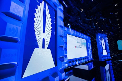 The stage backdrop featured subtle logos for Glaad, including an ampersand representing the organization's 'Together' movement, which is dedicated to intersectional issues including immigration, racial justice, women’s rights, and L.G.B.T.Q. acceptance. Most attendees donned pins with the symbol.
