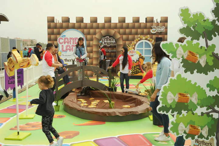 10 Best Ideas Of The Week A Life Size Candy Land Game Board A Paper Flower Installation Created From Parking Tickets American Express S Puppy Playground Bizbash