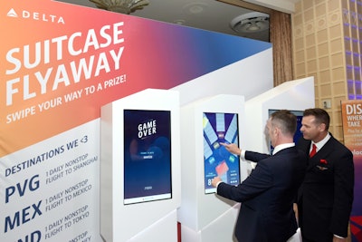 Delta had an activation dubbed “Suitcase Flyaway.” Guests were challenged to swipe suitcases onto the correct luggage belt and then to color-corresponding destinations. A leaderboard was displayed throughout the night, and guests with the top scores received free plane tickets.