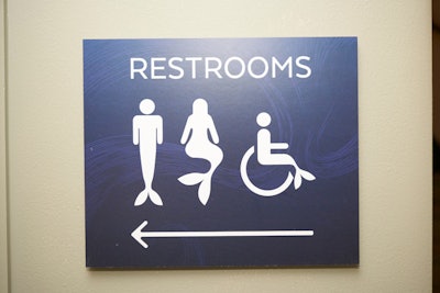 The restrooms featured custom signs for “mermaids” and “mermen.”