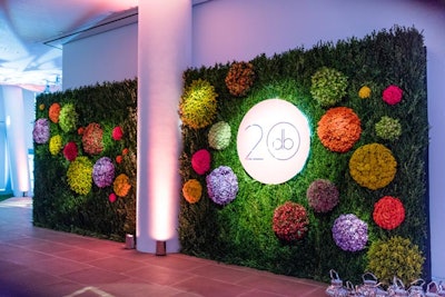 Designer David Beahm hosted a 20th-anniversary event in New York in March. Dubbed “A Riot of Color,” the evening asked guests to come dressed in their most colorful outfits, and an eye-catching step-and-repeat featured large, round collections of flowers on a wall of greenery.