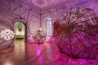 The duo of artists known as Hybycozo: the Hyperspace Bypass Construction Zone created steel sculptures that made intricate patterns on the Renwick's walls.