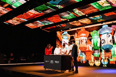 Tafoya and Flueck brought out chefs Daniel Boulud, Stephanie Izard, and Jose Garces to show off dishes inspired by their travels to Peru, China, and Spain, respectively. When Izard spoke, the screens depicted colorful Chinese lanterns.