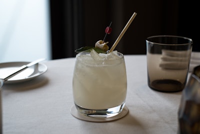 A Thai-inspired take on a classic Mai Tai, the restaurant’s Muay Thai is made with a rum infusion that Stodel creates in a cryogenic bag with lemongrass, ginger, and kaffir lime that are left over from the kitchen. He uses the remaining ingredients from the infusion to create a fruit leather-like garnish. The cocktail is also served with an uncultivated rye straw that’s natural and biodegradable.