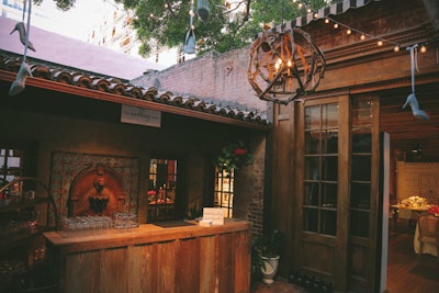 Decor in the outdoor area of the venue included hanging blue heels.