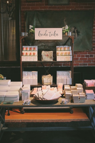 The “Bride Tribe” lounge offered items including wine glasses, notebooks, and canvas pouches.