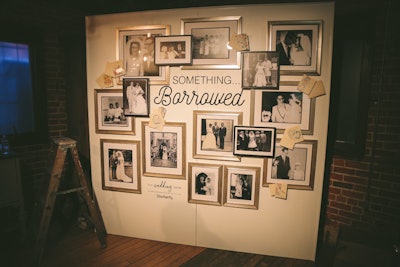 The “Something… Borrowed” wall had a vintage feel with framed black-and-white wedding photos.