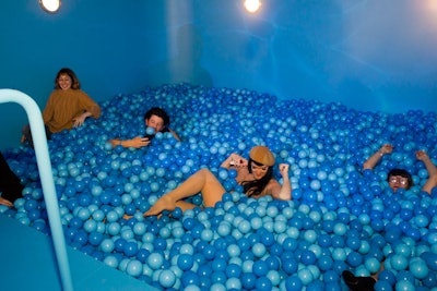 The end of the rainbow hallway leads to a room painted in blue that has a ball pit filled with 38,000 balls. The ball pit was designed to make guests feel like they are underwater in a pool. Solomon said the ball pit, which is a common experience at pop-up museums, was inspired by the dream of breathing underwater.