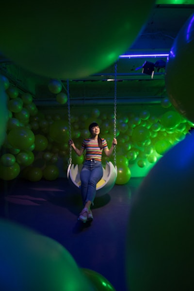 A downstairs green room was designed to take viewers inside of one of Ellis the Egg's more surreal dreams. The room has a swing that resembles a cracked egg shell.
