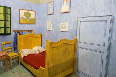 Recreations of easily recognizable images, like Vincent Van Gogh's painting of his bedroom, let guests interact with the setting to create a shot to their liking.