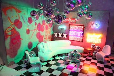 Four vignettes depicted various scenes from four of Monáe's new music videos. A nightclub-like space, which was inspired by the video for the song 'Make Me Feel,' featured graffiti, disco balls, and neon signage from Nights of Neon.