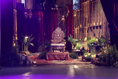 One area of the party had an ornate chair, greenery, and a live peacock, in a scene taken from the music video for 'Django Jane.'