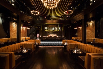 1 OAK's main dance floor is surrounded by booths, tables, and the main bar.