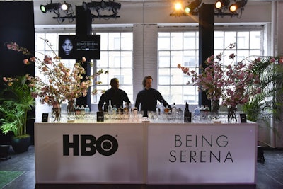A bar featured HBO’s branding and the title of the new docuseries along with seasonally appropriate cherry blossom arrangements.