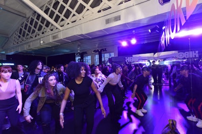 Celebrity choreographer Jose “Hollywood” Ramos led guests through a hip-hop-style dance routine inspired by Williams’s Vogue music video in which she dances to “Lemon” by N.E.R.D. and Rihanna on an airport runway.