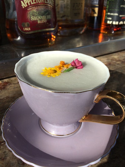 From mixologist Benny Hernandez at Area 31 at the Kimpton Epic Hotel in Miami, the Diamond Heart contains whiskey and is garnished with activated charcoal and micro flowers for a feminine touch in honor of the royal couple.