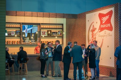 The exhibit’s flagship booth paid homage to Miller’s family of brands, including Miller High Life. The High Life bar was designed to capture the vintage look and feel of a bar from 1855, the year that Miller Brewing Company was founded.