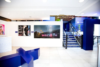 The pop-up converted a 12,000-square-foot, multi-level space at 336 Queen Street West into an immersive art exhibit. The space featured American Express branding on the steps and walls, as well as local artwork in the lobby.