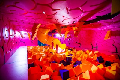 Attendees could literally slide into the final room, “Don’t Have Fun Without It,” created by artist Duro The Third. Riffing off the popular ball pit trend, the room featured a foam cube pit. Wooden lighting bolts were installed in the ceiling.