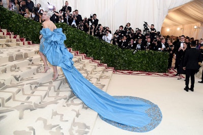 Sisal carpeting stenciled in white, gold, and burgundy extended from the arrival steps outside the Met into the Great Hall. It made for a dramatic complement to the red-carpet arrivals like Diane Kruger in her Prabal Gurung gown.