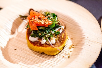 Chef Ouita Michel of the Holly Hill Inn in Midway, Kentucky, offered up a gleaned pumpkin hoecake topped with poke salat, spring onions, preserved radishes, and Kentucky pecans. “Gleaned” refers to the gathering of leftover produce after a harvest.