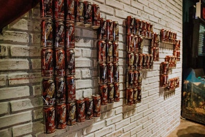 The initials of the sequel were spelled out on a wall with limited-edition cans of Mike’s Harder.