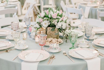 Designer Debi Lilly and her company A Perfect Event in Chicago planned a royal wedding-inspired tea party that incorporated Meghan's favorite flowers—peonies in pinks and whites—into the centerpieces.