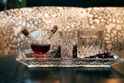 Created by bartender Laura Kruming at Sable Kitchen & Bar at the Kimpton Hotel Palomar Chicago, the Message in a Bottle cocktail boasts a royal price tag of $75 and is featured in the restaurant’s “Lap of Luxury” section. It’s a modern twist on a classic Manhattan made with hibiscus tea syrup.
