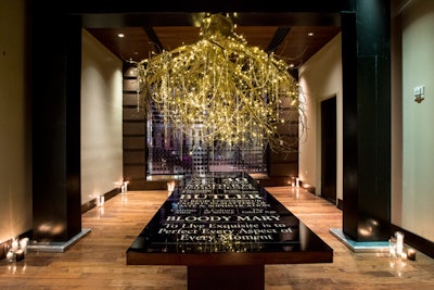 For St. Regis, BMF created an illuminated tree installation to demonstrate the history of the brand, which has roots that go back to 1904 in New York. The installation, which was inspired by the brand’s modern indulgence aesthetic, hung over a long table that displayed key milestones in the history of the brand.
