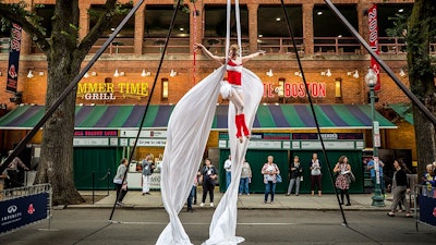 Conference attendees enjoy high-flying entertainment outside Fenway Park