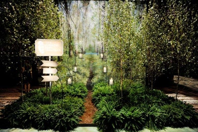 The New Yorkers for Children gala in fall 2012 had a 'light the way' theme, inspired by the nonprofit's mission to improve the lives of young people. David Stark handled the decor, embellishing a photo backdrop of a forest scene with white birch trees, lush greenery, and a path lit by lanterns.