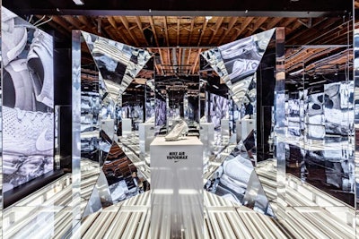 In March 2017, Nike celebrated the 30th anniversary of its original Air Max shoe with a week of “Sneakeasy” events. For the consumer pop-ups, which took place in New York, Los Angeles, Chicago, and Toronto, Blue Revolver designed Nike-inspired artwork, including this futuristic mirror backdrop that showcased the brand’s new Air VaporMax shoe, and interactive experiences.