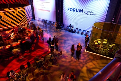 Guests could schedule meetings and lunches in 'cabins,' transparent cylinders that blocked out much of the general noise in an area near the entrance. The venue also featured a rotating carousel bar that served drinks and food.