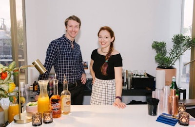 Two of our favorites—Kat and Mikey—serving up some serious smiles and Sazerac.