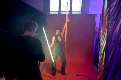 The event also had a photo booth that invited guests to pose with giant glow sticks.