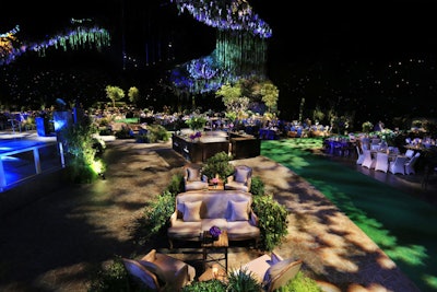 For the Television Academy's Governors Ball in 2016, which took place after the Emmys in Los Angeles, Sequoia Productions created a “Nature’s Elegance” theme. Centerpieces by LA Premiere alternated between low birch-wrapped looks and towering, colorful designs rising more than three feet tall off tabletops in trumpet-style vases; overall, the look included more than 50,000 hydrangeas, 80,000 roses, and 20,000 succulents. Fabrics were done in neutral, earth-inspired tones, and sequin mesh, metallic silks, and floral sequin organzas added an element of glamour.