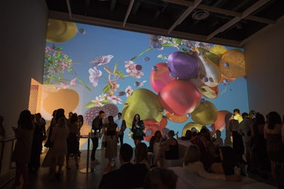 In another gallery room, artist Jennifer Steinkamp projected her 3-D computer animation titled 'Ovaries.' The imagery included various fruits represented as female reproductive parts.