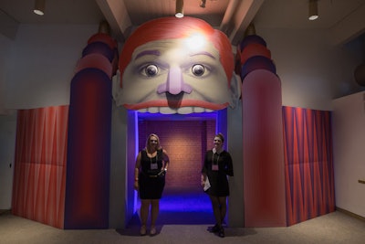 The entrance to the pre-reception gallery had guests walk through a giant clown mouth, which emitted a bubble gum haze.