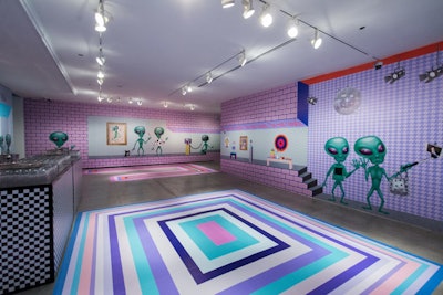 Montreal-based artist Dominique Pétrin wrapped one of the gallery rooms in her signature technicolored alien graphic patterns and illustrations.