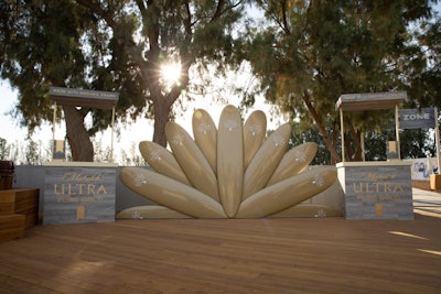 A sunburst-style display of golden surfboards served as the the centerpiece and photo wall for the activation, which will travel to the Vans U.S. Open of Surfing in Huntington Beach, California, in July and will return for the Surf Ranch Open in September.