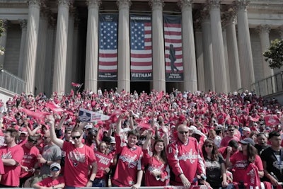 Washington Capitals fans gather on the steps of the National Archives Museum on June 12 to celebrate with the team during its Stanley Cup victory parade.