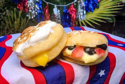 Trejo’s Coffee and Donuts in Los Angeles is offering two kinds of Fourth of July doughnuts this year. The lemon meringue doughnut is filled with lemon curd and topped with meringue, while a chantilly cream doughnut is mixed with strawberries and blueberries and topped with toasted coconuts.