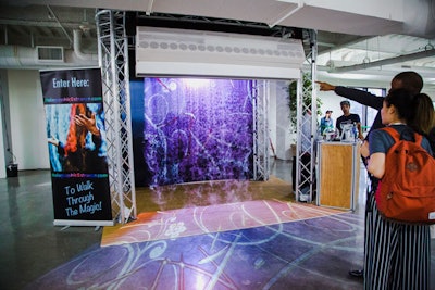 Holographic Entrance uses FogScreen technology that allows event guests to walk through projected video imagery. The effect is fully customizable; guests can be walking through company logos and graphics, pictures of guests of honor, and more. A speaker system can be added to further the effect. The screens are not actually made of fog—it’s high-velocity air channels—which means there’s no danger of setting off fire alarms or of guests getting wet. The activation is generally eight feet wide, but customization is possible.