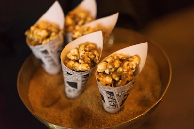 Paula LeDuc Fine Catering served popcorn in paper containers made from comic books.